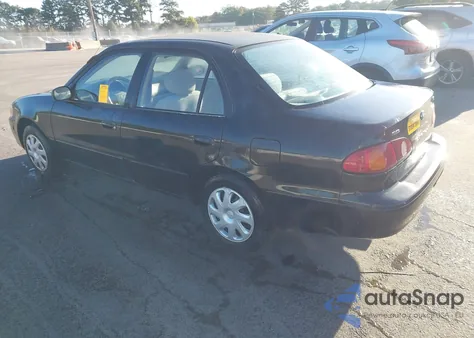 2001 Toyota Corolla Le z USA, uszkodzony, nr VIN 1NXBR12E71Z453244